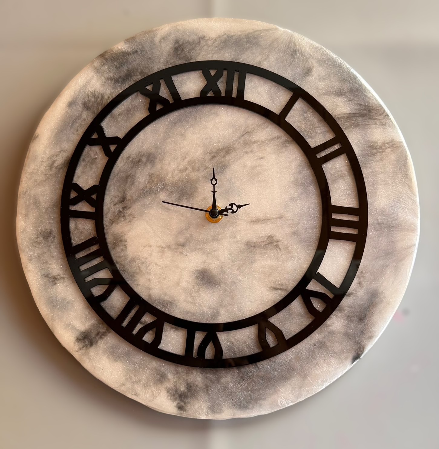 Round resin wall clock with Roman numerals